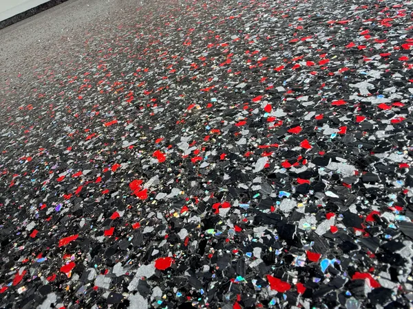 Red and black flake epoxy floor close-up