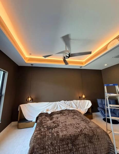 Bedroom tray ceiling with cove lighting
