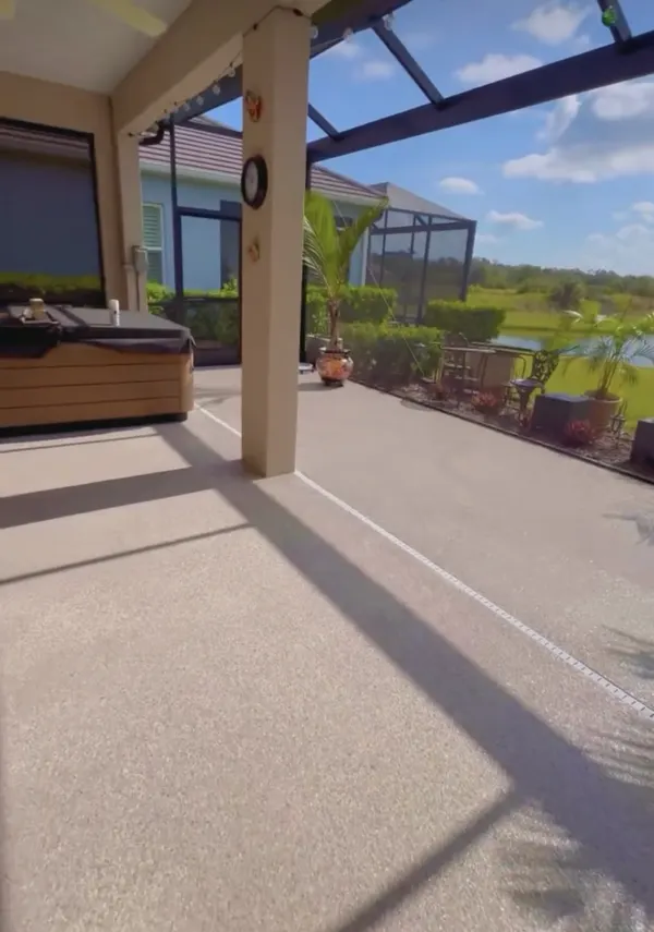 Tan flake epoxy lanai with spa