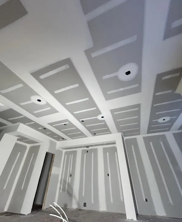 Coffered ceiling and wainscoting trim work in progress