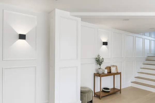 Wainscoting feature walls along staircase