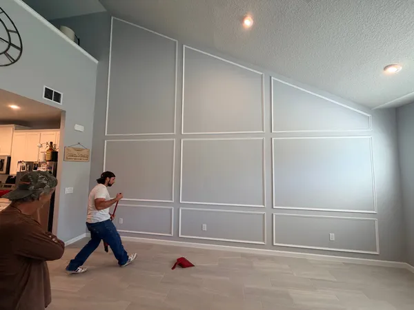 Picture-frame wainscoting feature wall in progress